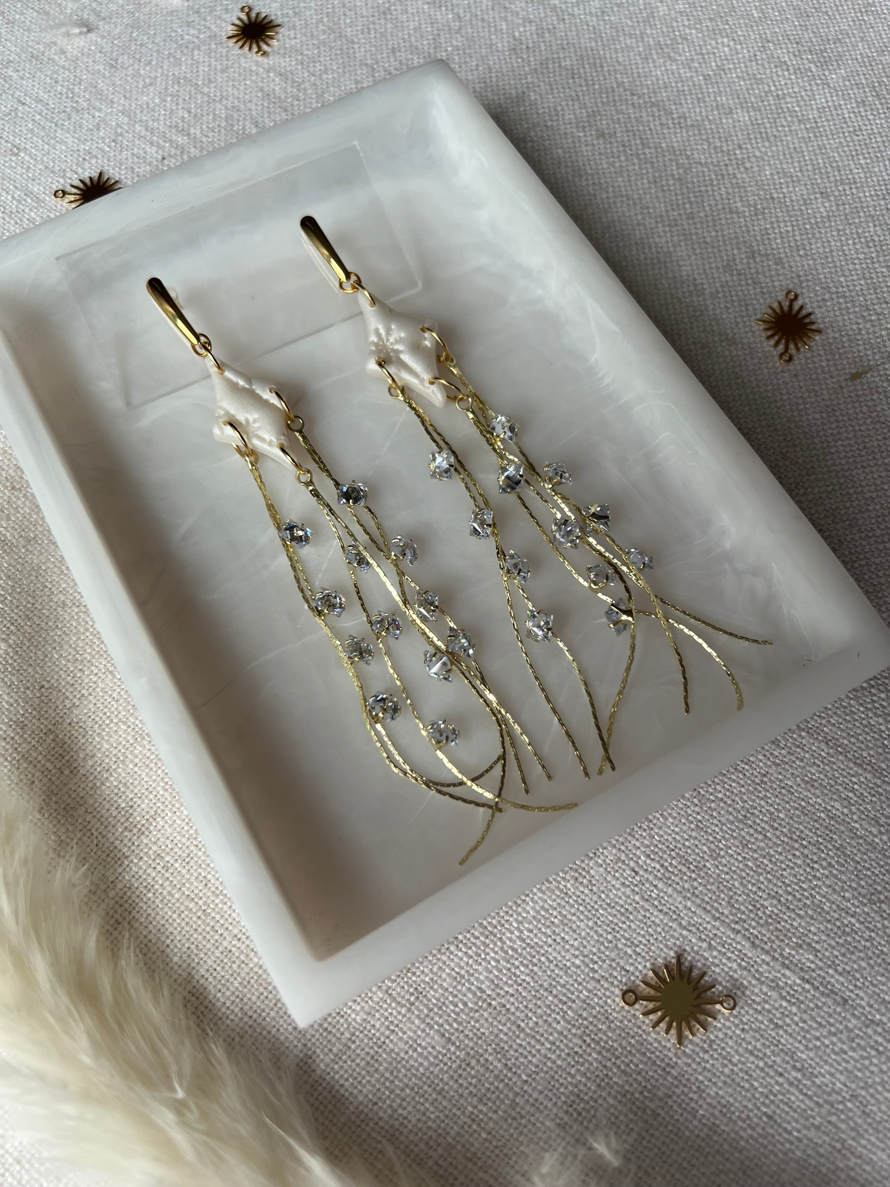 Cubic Zirconia Trailing Star Earrings