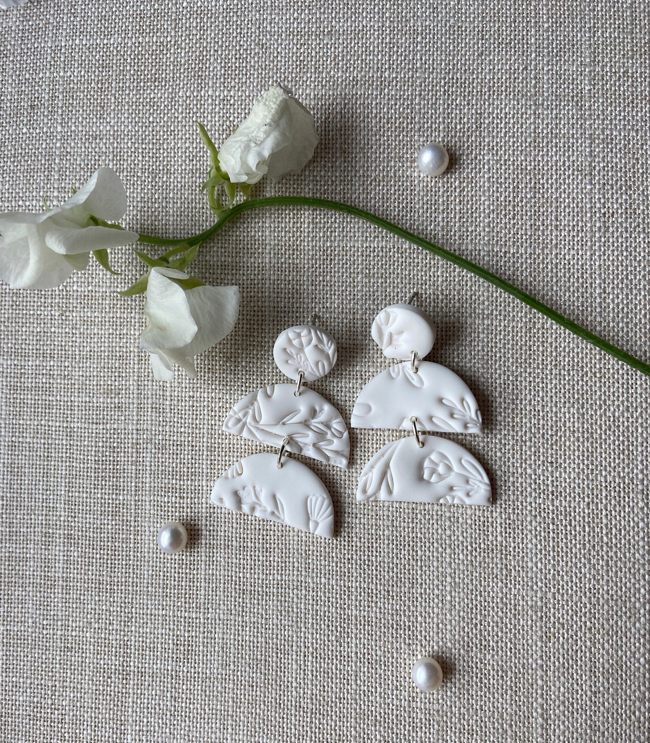 White Polymer Clay Earrings with Floral Texture